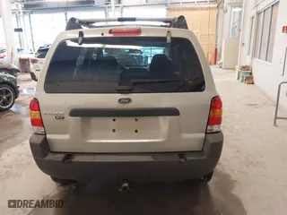 2004 Ford Escape XLT with VIN 1FMYU93164KB05521, listed as a IAAI auction lot 41723219 with 246,369 mi miles. Bid and sale history available at carsss.com. Image 16.