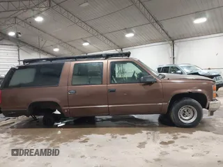1994 GMC Suburban with VIN 1GKEC16K1RJ738915, listed as a IAAI auction lot 41717424 with 173,338 mi miles. Bid and sale history available at carsss.com. Image 12.