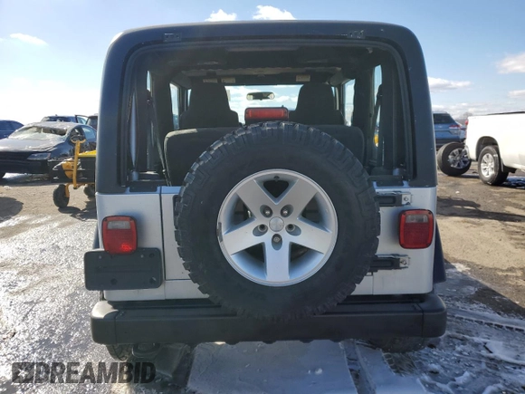 2004 Jeep Wrangler Rubicon with VIN 1J4FA69S14P766938, listed as a Copart auction lot 46284815 with 165,229 mi miles and Salvage Title. Bid and sale history available at carsss.com. Image 6.
