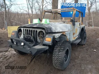 2003 Jeep Wrangler Sport with VIN 1J4FA49S93P374406, listed as a IAAI auction lot 41648982 with Not provided miles and . Bid and sale history available at DreamBid. Image 6.