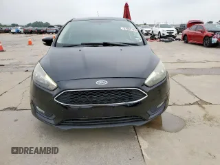 2015 Ford Focus SE z VIN 1FADP3F29FL357021, wystawiony jako Copart lot #57985125 z przebiegiem 142 786 mil mil oraz Szkoda całkowita • Salvage title. Historia ofert i sprzedaży dostępna na DreamBid. Obrazek 5.