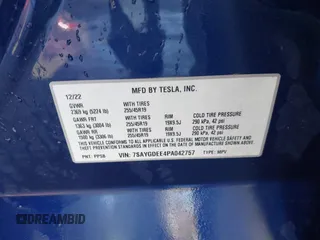 2023 Tesla Model Y Long Range with VIN 7SAYGDEE4PA042757, listed as a IAAI auction lot 41652541 with 48,569 mi miles. Bid and sale history available at carsss.com. Image 9.