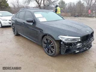 2020 BMW M5 Competition with VIN WBSJF0C00LCD37331, listed as a IAAI auction lot 41738410 with NaN miles. Bid and sale history available at carsss.com. Image 1.