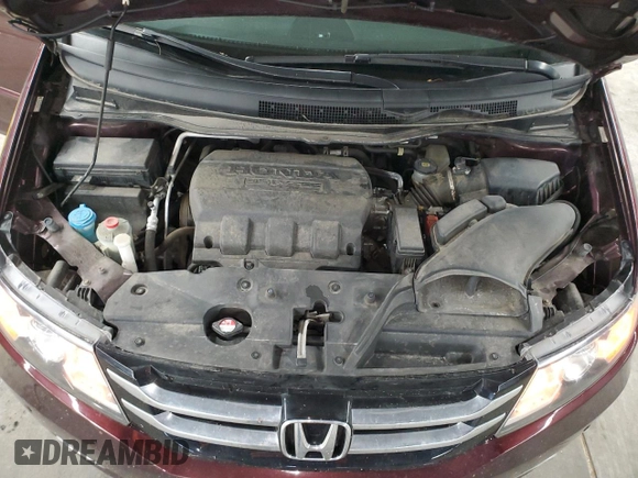 2014 Honda Odyssey Touring with VIN 5FNRL5H93EB079817, listed as a Copart auction lot 56231645 with 65,521 mi miles and Salvage title. Bid and sale history available at DreamBid. Image 12.