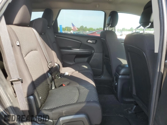 2013 Dodge Journey SXT with VIN 3C4PDCBG4DT619319, listed as a Copart auction lot 62964135 with 140,620 mi miles and Salvage title. Bid and sale history available at DreamBid. Image 11.