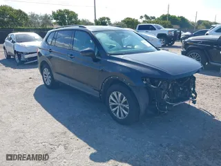 2018 Volkswagen Tiguan S with VIN 3VV1B7AX6JM036407, listed as a IAAI auction lot 41705021 with 84,171 mi miles. Bid and sale history available at carsss.com. Image 1.