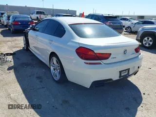 2014 BMW 6 Series 650i xDrive with VIN WBA6B4C5XED099197, listed as a IAAI auction lot 41744557 with 174,613 mi miles. Bid and sale history available at carsss.com. Image 3.
