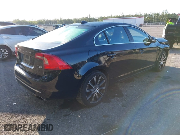 2017 Volvo S60 Inscription with VIN LYV402HK7HB130410, listed as a IAAI auction lot 41751317 with 97,339 mi miles. Bid and sale history available at carsss.com. Image 4.