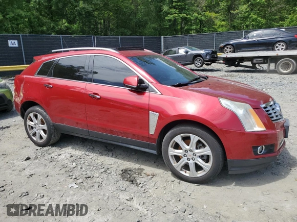 2016 Cadillac SRX Premium Collection with VIN 3GYFNDE3XGS508897, listed as a Copart auction lot 57886515 with 163,477 mi miles and Salvage title. Bid and sale history available at DreamBid. Image 4.