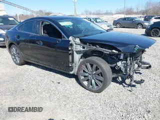2019 Mazda 6 Grand Touring with VIN JM1GL1TY7K1501946, listed as a IAAI auction lot 41786545 with 118,800 mi miles. Bid and sale history available at carsss.com. Image 1.