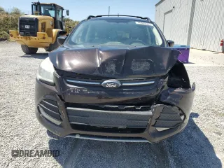 2013 Ford Escape SE с VIN 1FMCU9G91DUC25077, выставлен на аукционе Copart как лот 60888305 с пробегом 212 409 миль миль и Списание • Salvage title. История ставок и продаж доступна на DreamBid. Изображение 5.