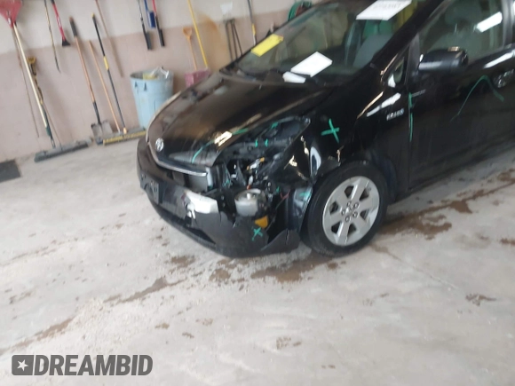 2009 Toyota Prius with VIN JTDKB20U993491553, listed as a IAAI auction lot 42103083 with 166,562 mi miles. Bid and sale history available at carsss.com. Image 6.