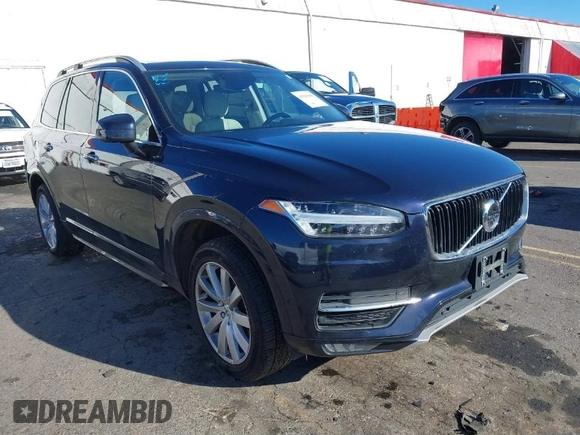 2017 Volvo XC90 Momentum with VIN YV4A22PK3H1116166, listed as a IAAI auction lot 41543940 with 104,879 mi miles. Bid and sale history available at carsss.com. Image 1.