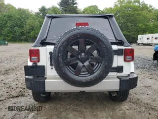 2013 Jeep Wrangler Unlimited Sahara with VIN 1C4HJWEG4DL562951, listed as a Copart auction lot 58001475 with 95,744 mi miles and Clean title. Bid and sale history available at DreamBid. Image 6.