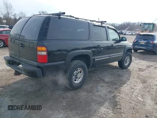 2000 Chevrolet Suburban LT with VIN 3GNGK26U0YG197958, listed as a IAAI auction lot 41506196 with 229,657 mi miles. Bid and sale history available at carsss.com. Image 4.