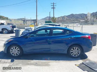 2015 Hyundai Elantra Limited with VIN KMHDH4AE8FU304086, listed as a IAAI auction lot 41830380 with 72,860 mi miles. Bid and sale history available at carsss.com. Image 14.
