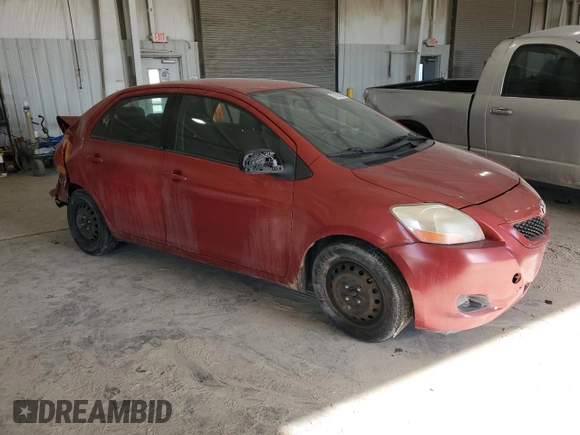 2009 Toyota Yaris with VIN JTDBT903891313898, listed as a Copart auction lot 87820085 with 212,806 mi miles and Salvage Title. Bid and sale history available at carsss.com. Image 4.