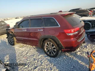 2018 Jeep Grand Cherokee Overland with VIN 1C4RJFCT3JC453784, listed as a Copart auction lot 71921944 with 56,097 mi miles and Salvage title. Bid and sale history available at DreamBid. Image 2.