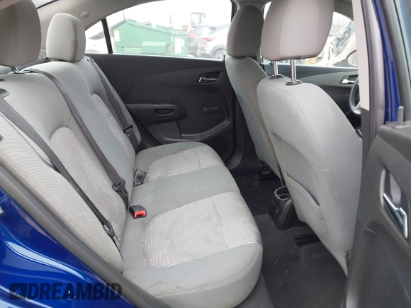 2012 Chevrolet Sonic LS z VIN 1G1JA5SH6C4199806, wystawiony jako IAAI lot #41454660 z przebiegiem 124 691 mil mil oraz . Historia ofert i sprzedaży dostępna na DreamBid. Obrazek 8.