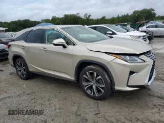 2019 Lexus RX 350L Premium with VIN JTJGZKCA0K2009452, listed as a Copart auction lot 61174785 with 60,403 mi miles and Salvage title. Bid and sale history available at DreamBid. Image 4.