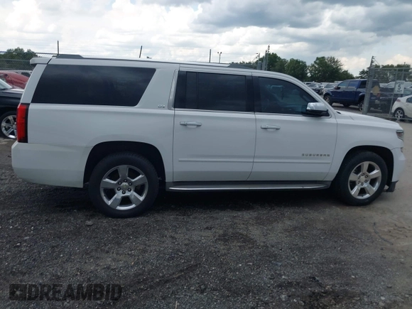 2015 Chevrolet Suburban LTZ with VIN 1GNSCKKC4FR239114, listed as a IAAI auction lot 42832146 with 183,711 mi miles and . Bid and sale history available at DreamBid. Image 13.