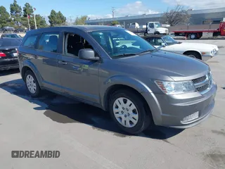 2013 Dodge Journey SE with VIN 3C4PDCAB7DT730744, listed as a IAAI auction lot 41900114 with 186,086 mi miles. Bid and sale history available at carsss.com. Image 1.