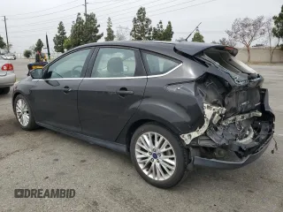 2015 Ford Focus Titanium z VIN 1FADP3N25FL324390, wystawiony jako Copart lot #59801805 z przebiegiem 97 615 mil mil oraz Szkoda całkowita • Salvage title. Historia ofert i sprzedaży dostępna na DreamBid. Obrazek 2.