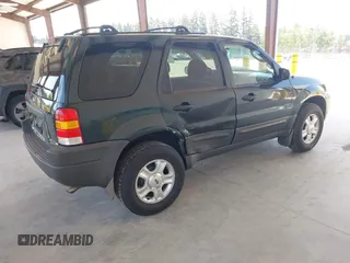 2003 Ford Escape XLT Popular 2 with VIN 1FMCU931X3KC16646, listed as a IAAI auction lot 42160863 with 130,603 mi miles and . Bid and sale history available at DreamBid. Image 4.