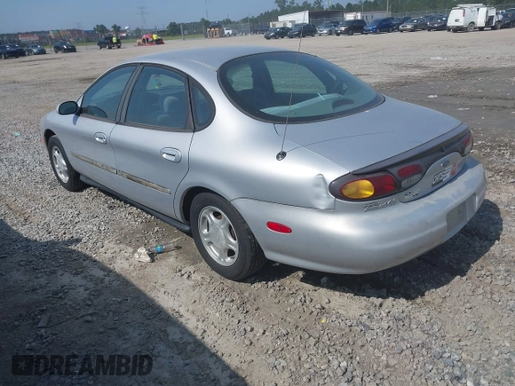 1997 Ford Taurus GL z VIN 1FALP52U9VA295404, wystawiony jako IAAI lot #42234839 z przebiegiem 163 080 mil mil oraz . Historia ofert i sprzedaży dostępna na DreamBid. Obrazek 3.