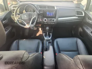 2015 Honda Fit EX-L with VIN 3HGGK5H87FM708737, listed as a Copart auction lot 64310745 with 90,446 mi miles and Salvage title. Bid and sale history available at DreamBid. Image 8.