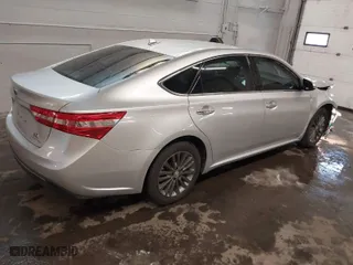 2013 Toyota Avalon Hybrid XLE Premium with VIN 4T1BD1EB5DU005850, listed as a IAAI auction lot 41559515 with 152,206 mi miles. Bid and sale history available at carsss.com. Image 4.