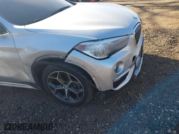 2018 BMW X1 xDrive28i with VIN WBXHT3C30J5L29757, listed as a IAAI auction lot 41879504 with 60,490 mi miles. Bid and sale history available at carsss.com. Image 6.
