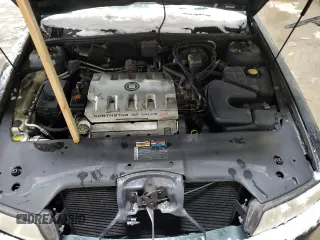 2000 Cadillac Seville Touring STS z VIN 1G6KY5494YU220613, wystawiony jako Copart lot #87338724 z przebiegiem 106 313 mil mil oraz Szkoda całkowita • Salvage title. Historia ofert i sprzedaży dostępna na DreamBid. Obrazek 11.