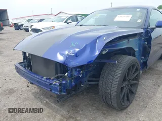 2016 Ford Mustang V6 z VIN 1FA6P8AM5G5271029, wystawiony jako IAAI lot #42277315 z przebiegiem 39 496 mil mil oraz . Historia ofert i sprzedaży dostępna na DreamBid. Obrazek 6.