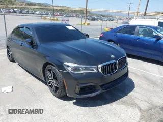 2018 BMW 7 Series 750i with VIN WBA7F0C51JGM23504, listed as a IAAI auction lot 39379378 with 82,251 mi miles. Bid and sale history available at carsss.com. Image 1.