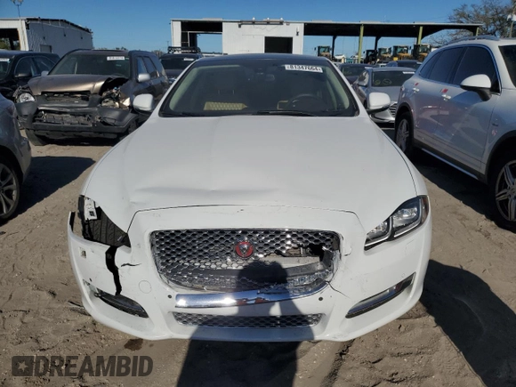 2016 Jaguar XJ Portfolio with VIN SAJWA2G72G8W00103, listed as a Copart auction lot 81347664 with 45,917 mi miles and Salvage title. Bid and sale history available at DreamBid. Image 5.