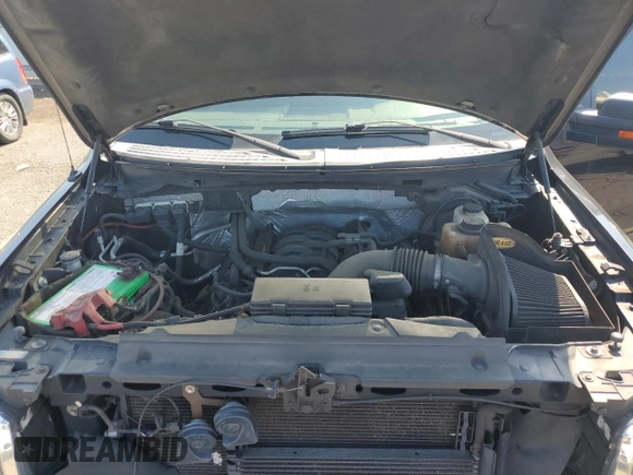 2013 Ford F-150 XL with VIN 1FTFW1EFXDFB40832, listed as a Copart auction lot 63705155 with 154,764 mi miles and Salvage title. Bid and sale history available at DreamBid. Image 11.