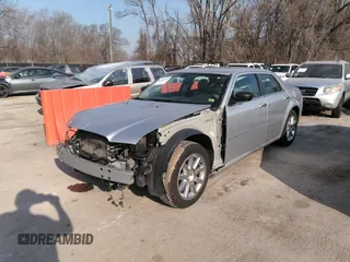 2007 Chrysler 300 Touring with VIN 2C3LA53G57H785979, listed as a IAAI auction lot 36241614 with 220,841 mi miles. Bid and sale history available at carsss.com. Image 2.
