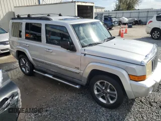 2006 Jeep Commander with VIN 1J8HH48K96C289162, listed as a Copart auction lot 80979074 with 170,581 mi miles and Salvage title. Bid and sale history available at DreamBid. Image 4.