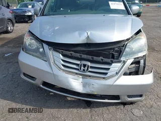 2010 Honda Odyssey EX-L with VIN 5FNRL3H78AB034756, listed as a IAAI auction lot 41979532 with 167,791 mi miles and . Bid and sale history available at DreamBid. Image 6.