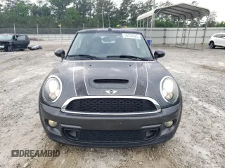 2013 MINI Convertible S с VIN WMWZP3C58DT550592, выставлен на аукционе Copart как лот 56250685 с пробегом 141 821 миль миль и Списание • Salvage title. История ставок и продаж доступна на DreamBid. Изображение 5.