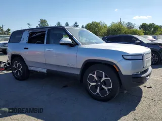 2024 Rivian R1S Adventure with VIN 7PDSGBBA4RN036045, listed as a Copart auction lot 74982414 with 9,256 mi miles and Salvage Title. Bid and sale history available at carsss.com. Image 4.