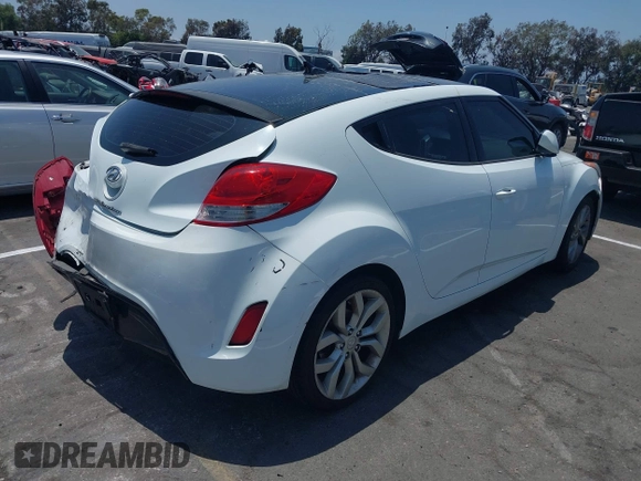 2012 Hyundai Veloster w/Black Int z VIN KMHTC6AD5CU056209, wystawiony jako IAAI lot #42565571 z przebiegiem 137 908 mil mil oraz . Historia ofert i sprzedaży dostępna na DreamBid. Obrazek 4.