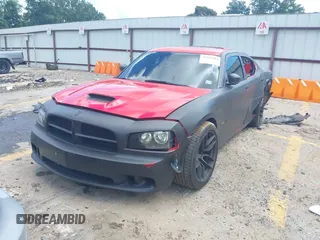 2008 Dodge Charger SRT-8 with VIN 2B3KA73W98H104803, listed as a IAAI auction lot 39911604 with Not Provided miles and . Bid and sale history available at DreamBid. Image 2.