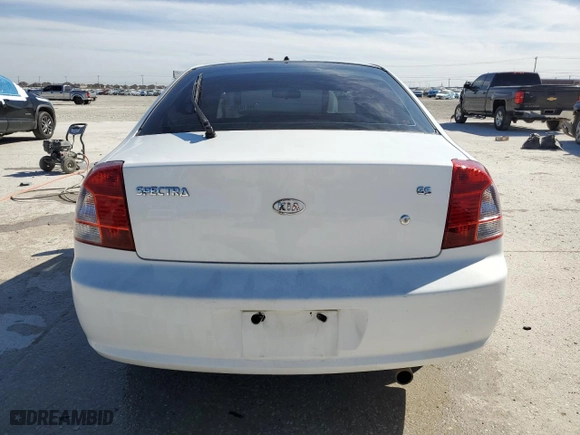 2002 Kia Spectra GS with VIN KNAFB161725077686, listed as a Copart auction lot 48618095 with 99,702 mi miles and Salvage Title. Bid and sale history available at carsss.com. Image 6.