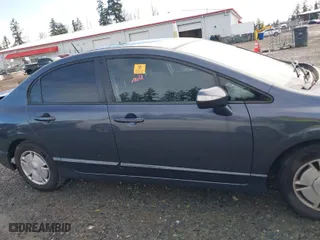 2009 Honda Civic Hybrid with VIN JHMFA36209S008939, listed as a IAAI auction lot 41798952 with 163,650 mi miles. Bid and sale history available at carsss.com. Image 13.