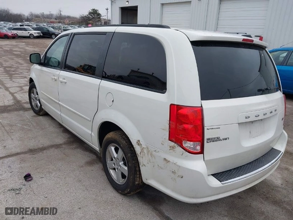 2011 Dodge Grand Caravan Mainstreet with VIN 2D4RN3DG7BR640199, listed as a IAAI auction lot 38633071 with 148,846 mi miles. Bid and sale history available at carsss.com. Image 3.