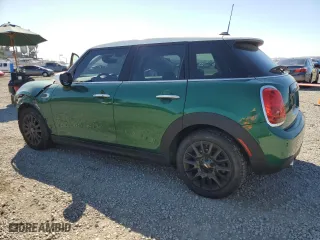 2021 MINI Hardtop 4 Door Oxford Edition with VIN WMWXU7C04M2N55158, listed as a Copart auction lot 79089084 with 50,102 mi miles and Salvage Title. Bid and sale history available at carsss.com. Image 2.