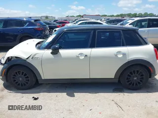 2016 MINI Hardtop 4 Door z VIN WMWXU1C50G2D08848, wystawiony jako IAAI lot #42215256 z przebiegiem 102 643 mil mil oraz . Historia ofert i sprzedaży dostępna na DreamBid. Obrazek 15.