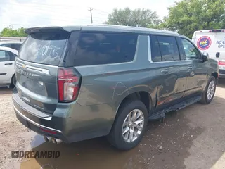 2023 Chevrolet Suburban Premier with VIN 1GNSCFKD6PR393843, listed as a IAAI auction lot 42101935 with 59,604 mi miles. Bid and sale history available at carsss.com. Image 4.
